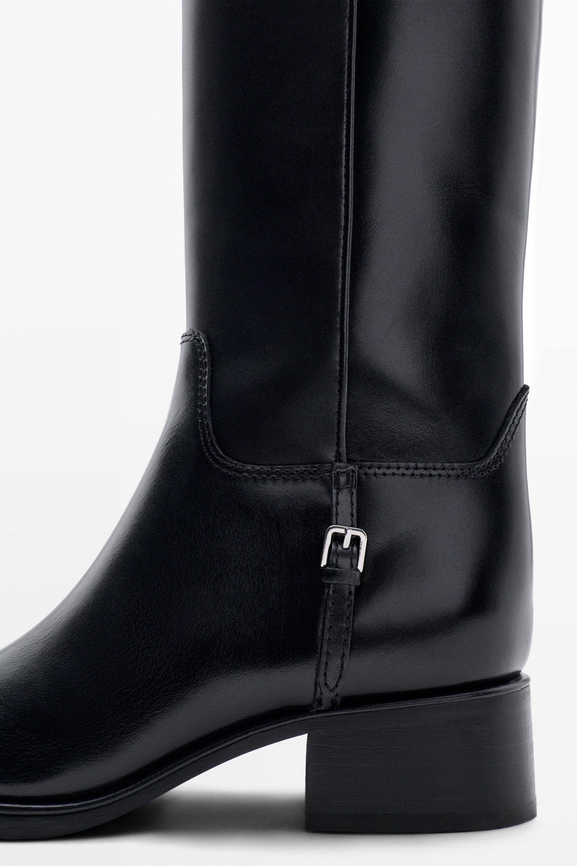 Bottes plates en cuir à boucle latérale